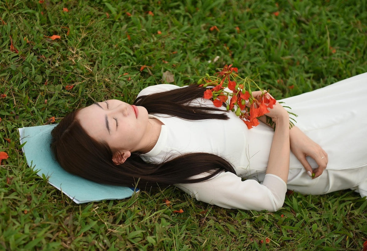 Woman sleeping with herbs