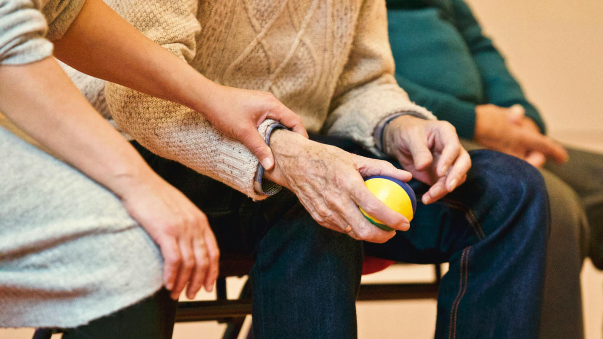 A man doing arthritis exercises