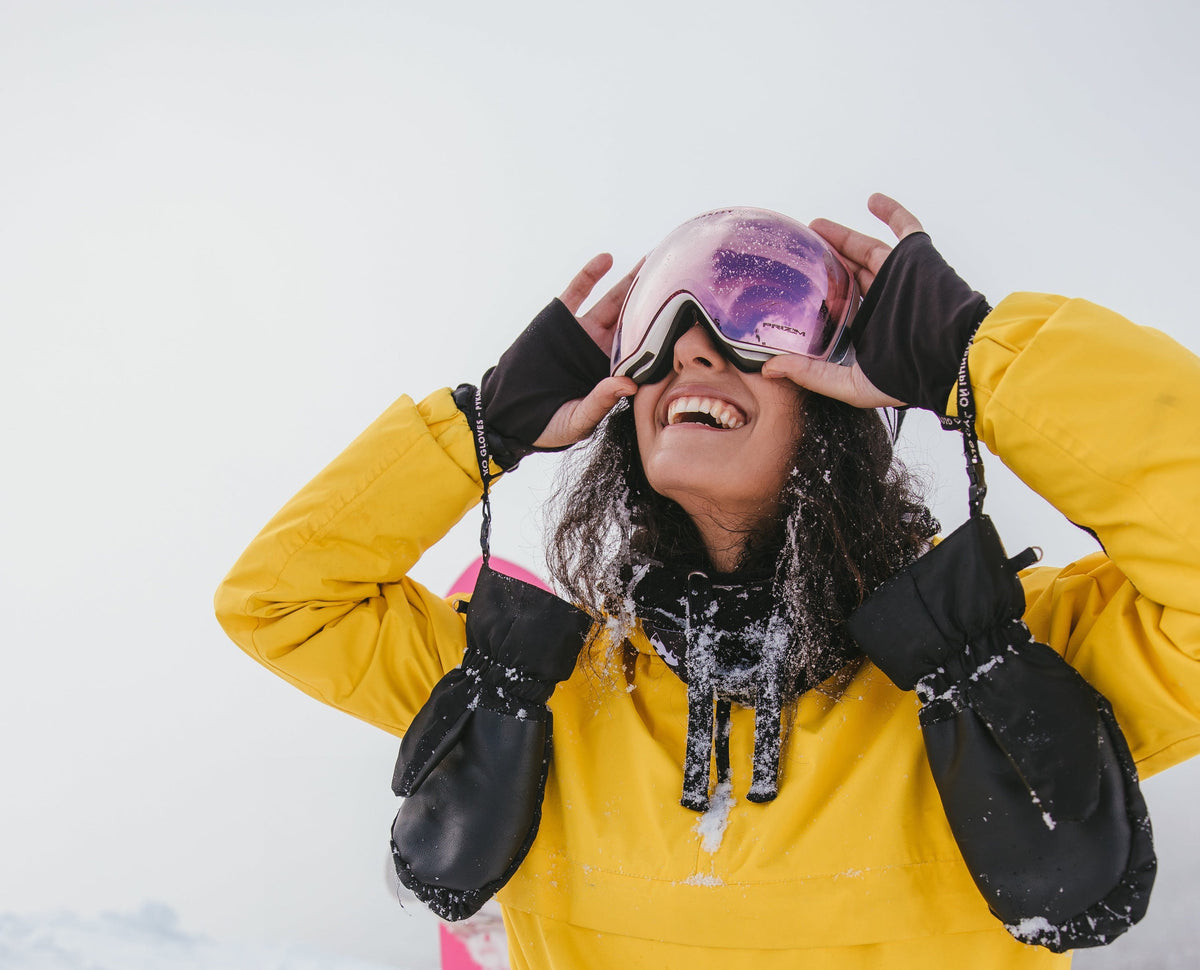 Woman Enjoying Skiing with Glowing Skin