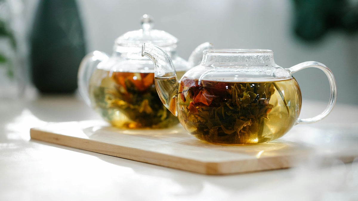 Chinese herbal calming tea ritual with Dragon Hemp Sleep Tincture and Wellness Tincture