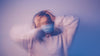 Person pausing to breathe before a social gathering, easing anticipatory social anxiety